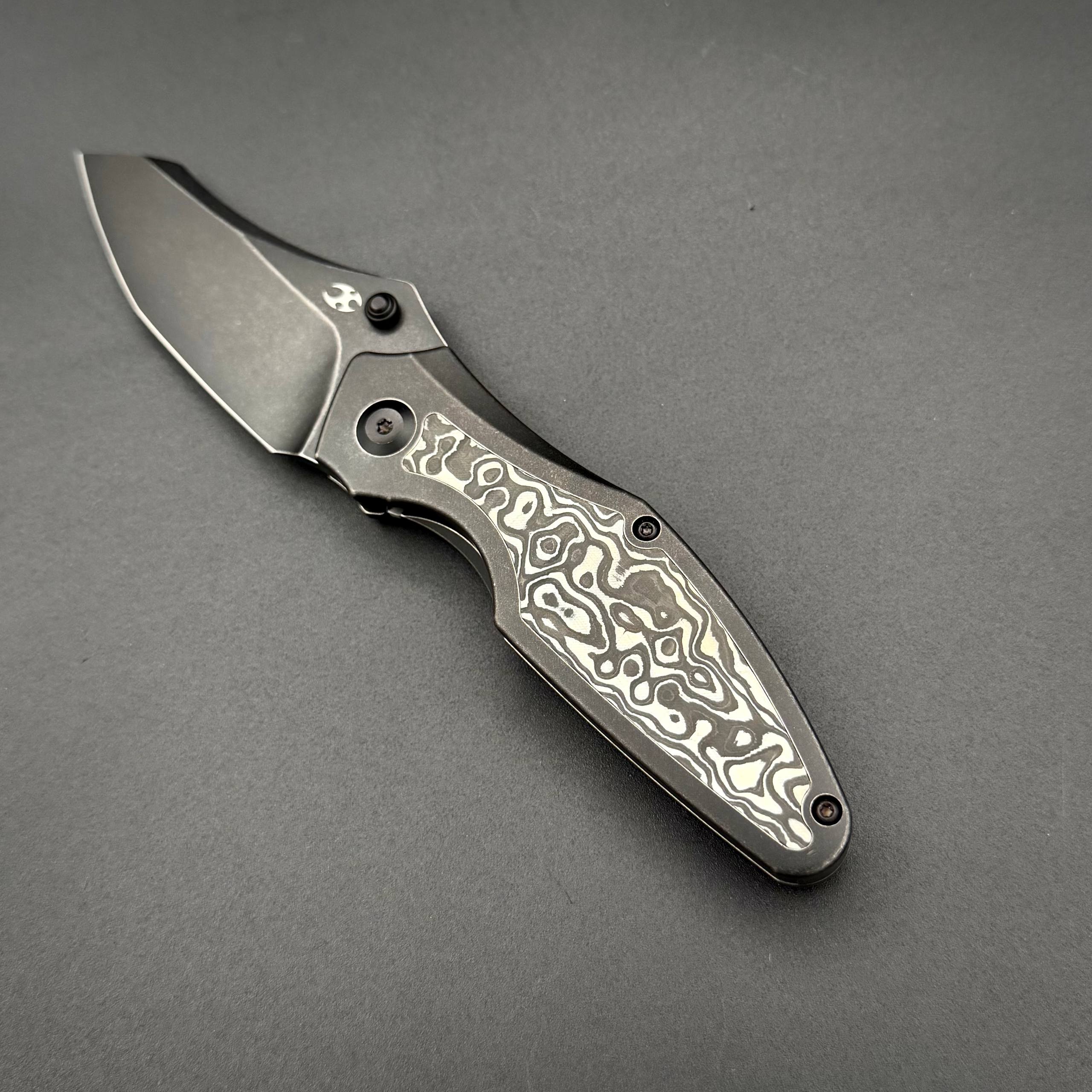 Складной нож Kansept Baba Yaga CPM 20CV Blackwash Titanium Black White Nebula Carbon Inlay